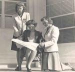 Physical Education instructor Mrs. Eleanor Riordan with students Audrey Hull and Ruth Waters